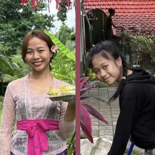 Zwei Frauen in balinesischer Kleidung, lächelnd in einer Gartenlandschaft.